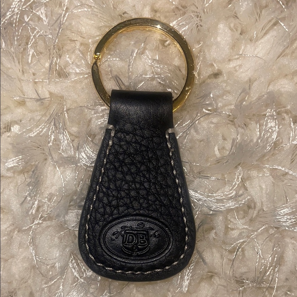 Dooney & Burke Luxurious Black and Gold Key Holder